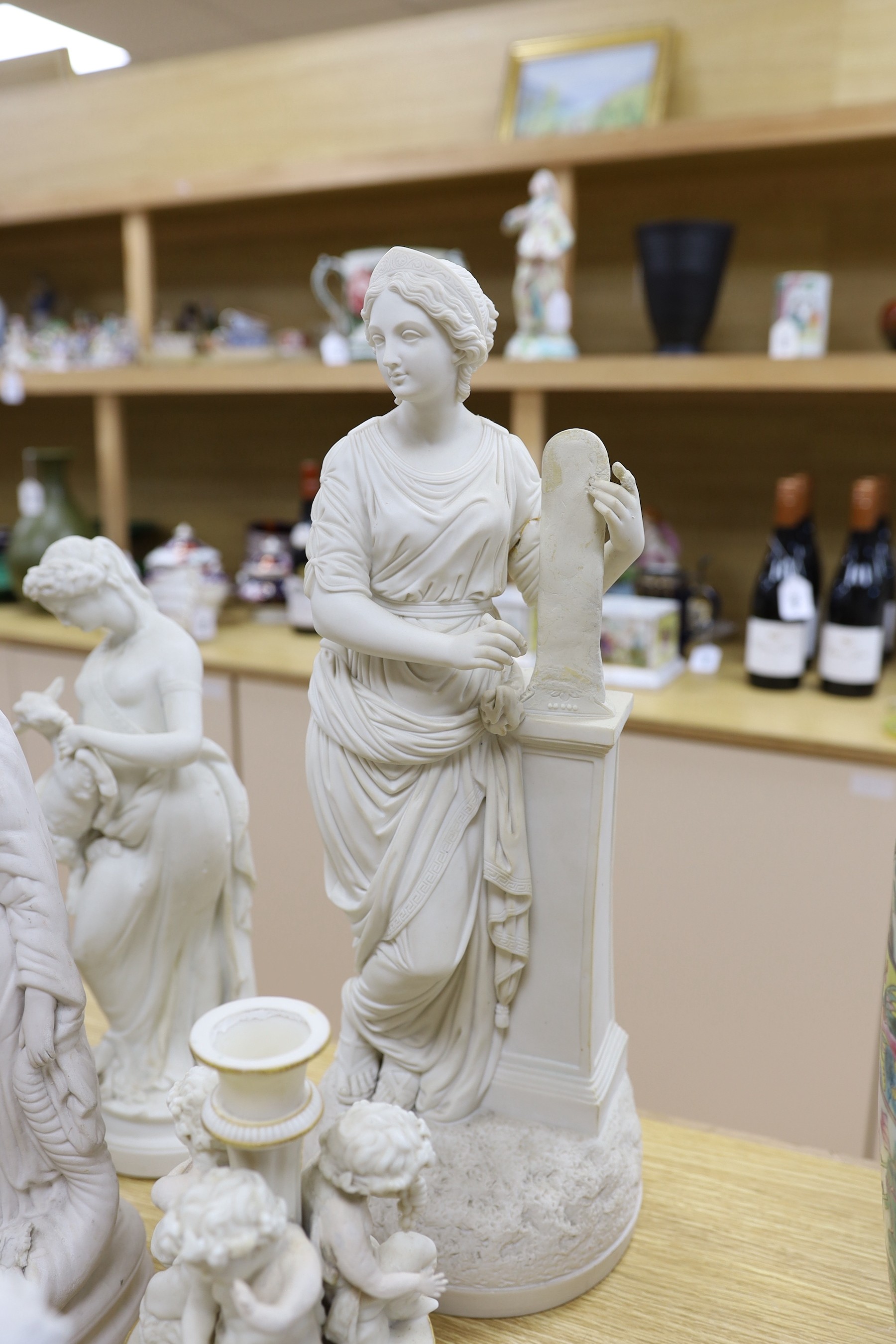 A group of Parian ware and bisque figures/ornaments. Some restoration (8) tallest 45cm